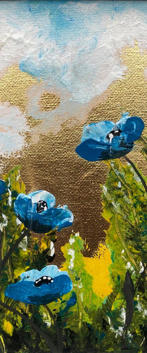 Blue poppies on gold leaf by Marja Brown