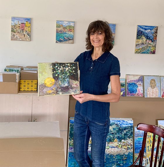 Still life with wildflowers and a lemon