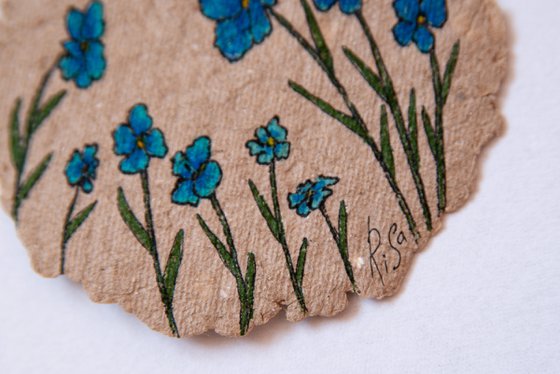 Blue flowers drawing on the author's craft paper