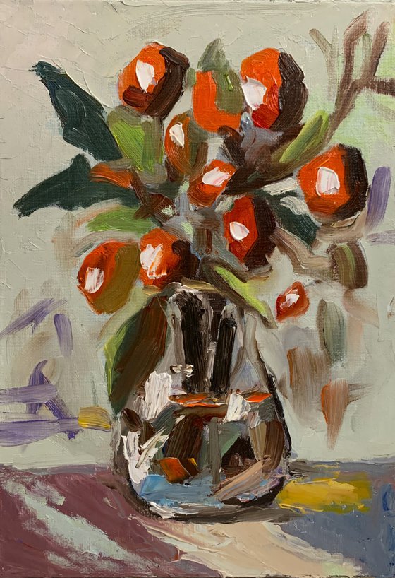 Olive branch in vase.