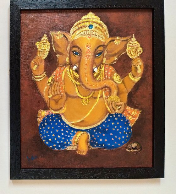 Lord Ganesh with blue eyes