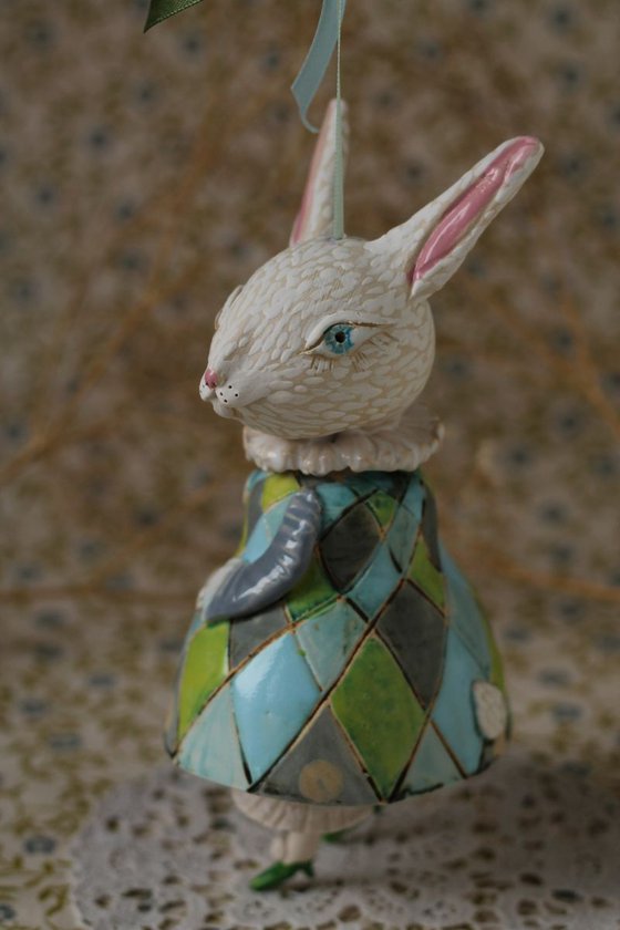 Little rabbit in harlequin dress. Hanging sculpture, bell doll by Elya Yalonetski