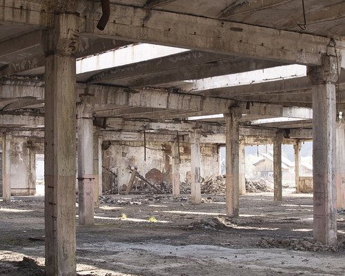 An abandoned factory, Bucovina, Romania by Julia Clay