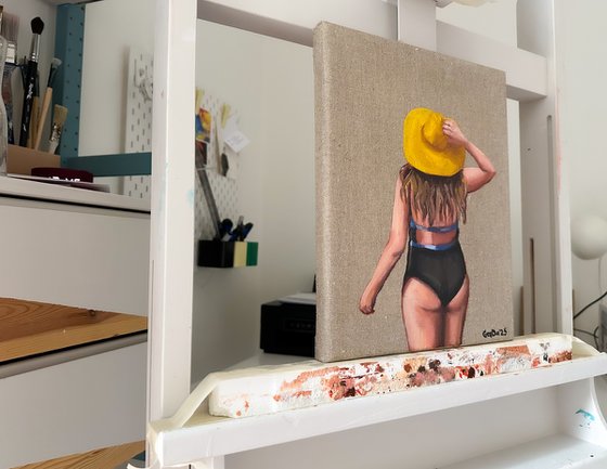 Girl in the yellow sun hat
