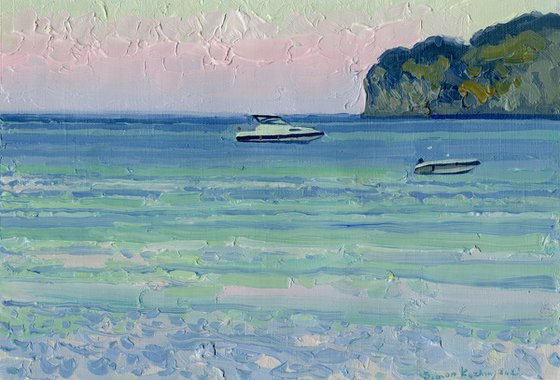 Sunset. Boats on the sea