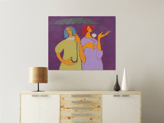 Two under an umbrella.