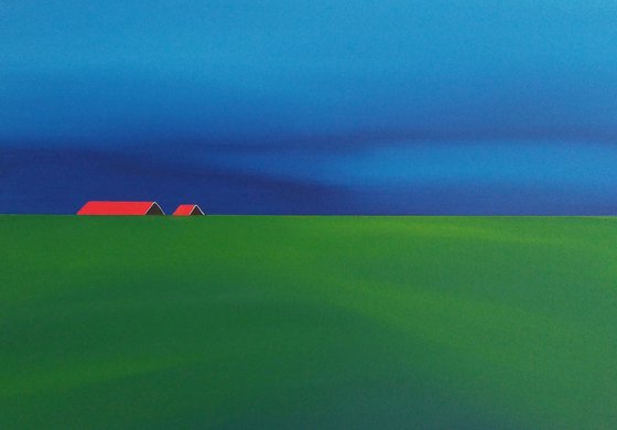 Red roofs, blue sky, green fields.