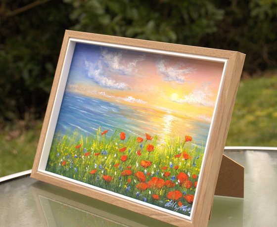 Sunset seascape on the wildflower meadow