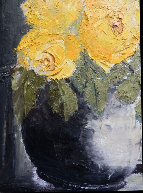 Yellow roses in a window