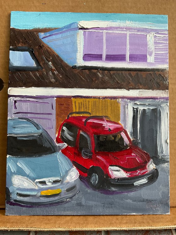Cars parked near the house
