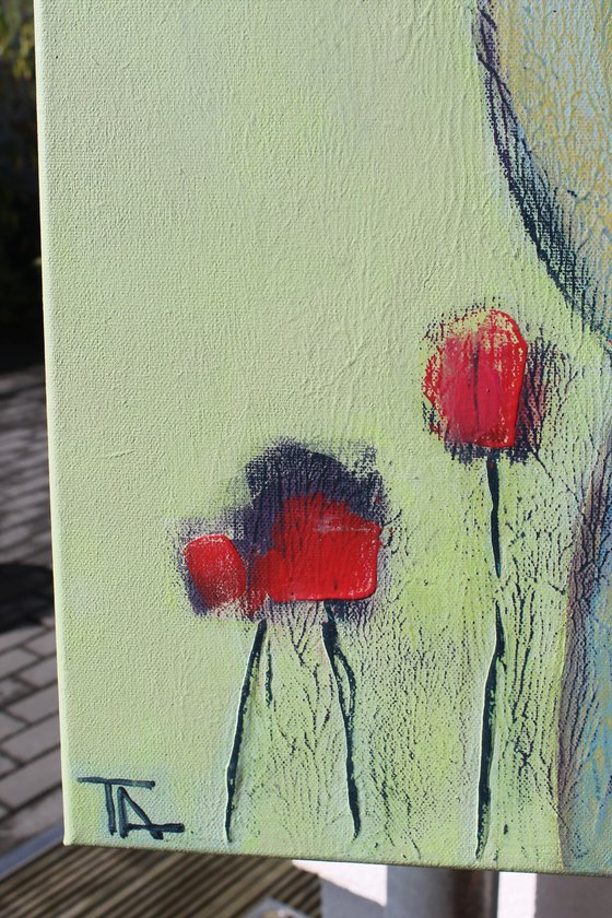 Girls collecting tulips.