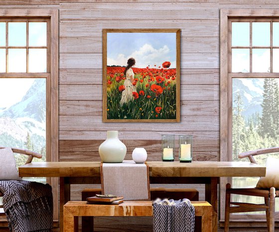 Woman in a red poppy field