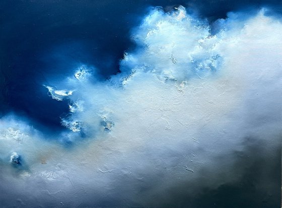 Storm clouds over fields