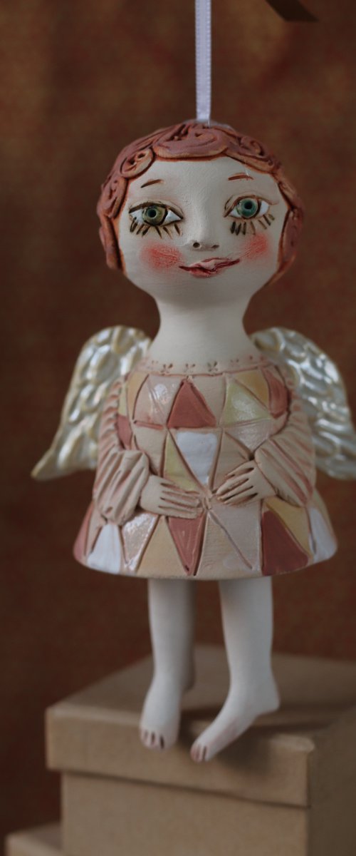 Tiny hanging sculpture by Elya Yalonetski. Angel by Elya Yalonetski