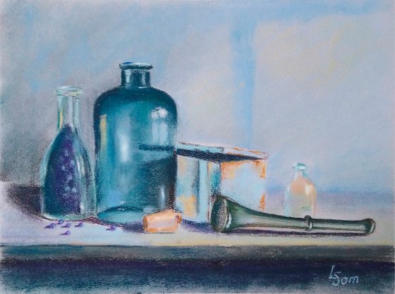 Green bottle and pestle