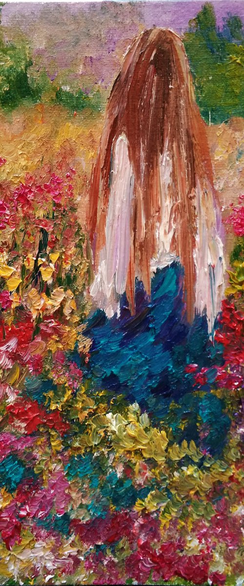 Girl in a flower field by Oksana Fedorova