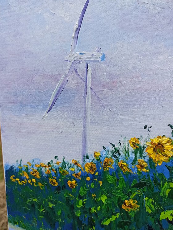 Sunflowers and a contemporary windmill. Pleinair painting