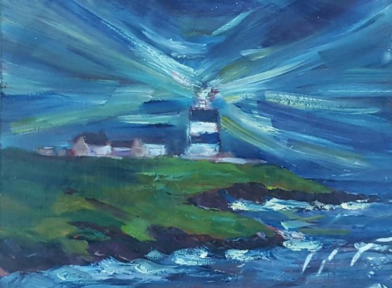 The light of Hookhead lighthouse as Dusk falls