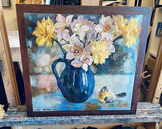 Daffodils in a blue vase