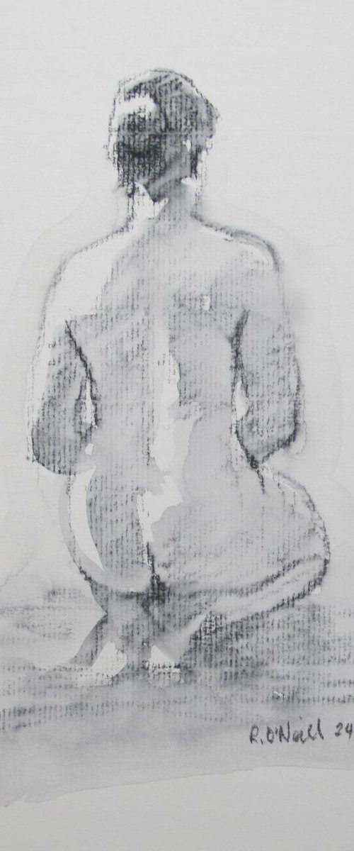 Seated female nude back view by Rory O’Neill