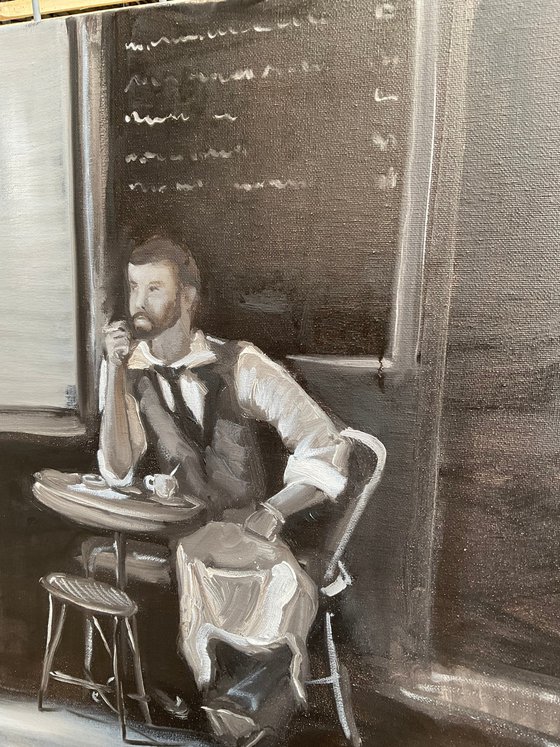 Waiter in cafe on a break