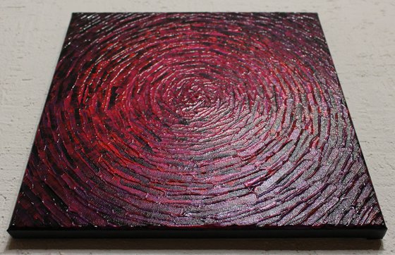 Concentric purplish red burst