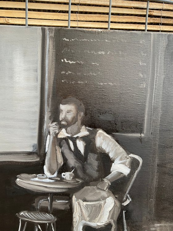 Waiter in cafe on a break