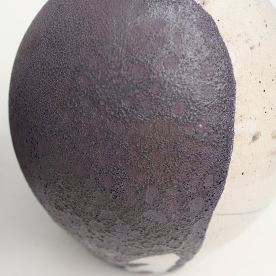 2 raku and black vessels