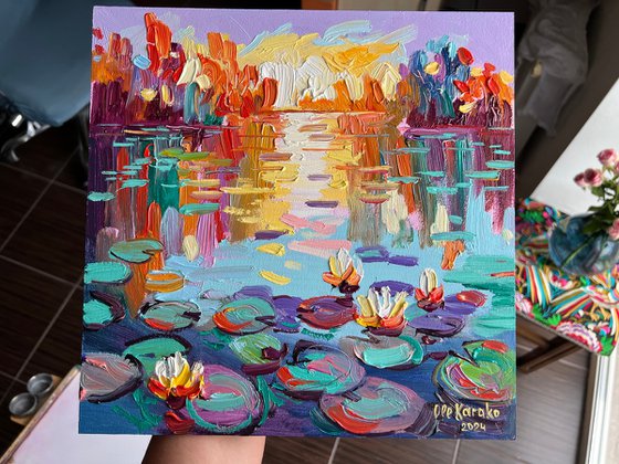 Sunset on a Pond with Water Lilies