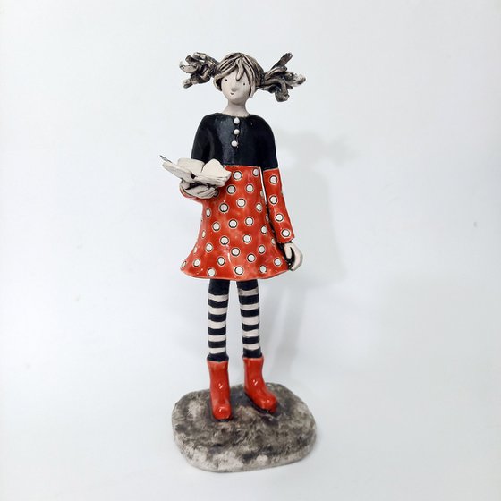 The Girl with the Butterfly. Ceramic sculpture