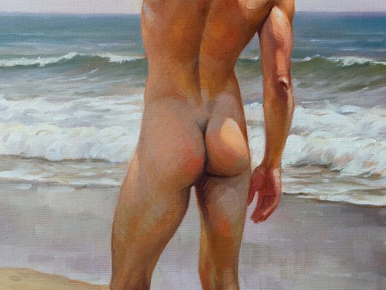 NUDE MAN BY THE SEA