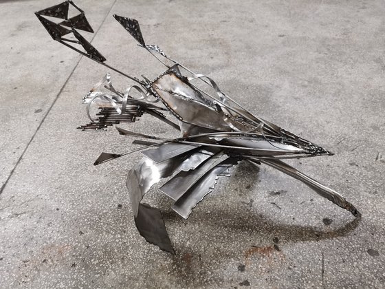 Unique welded iron sculpture beautiful space effects Star bird following the energy trail or her half signed O KLOSKA