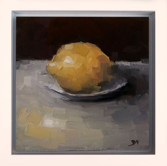 Lemon with plate.