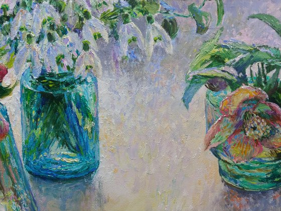 Flowers in blue glass