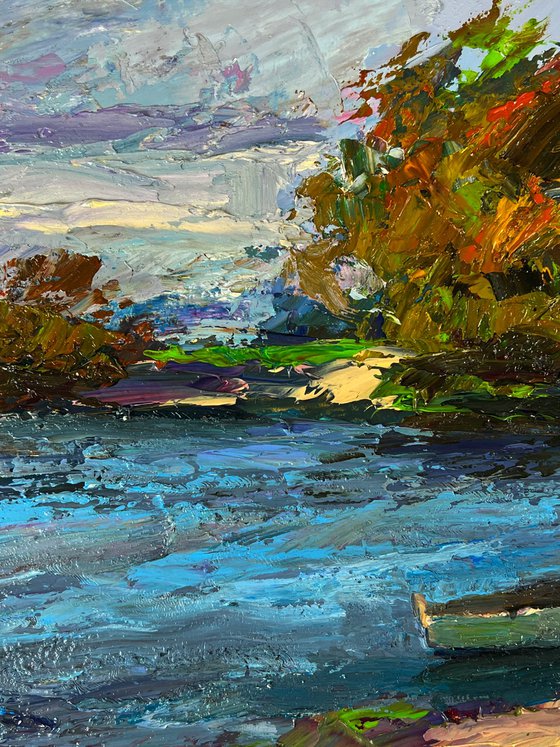 A Boat on the River Bank