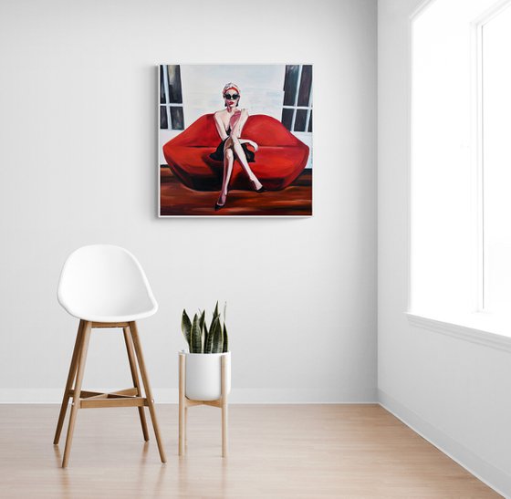 Elegant Woman on Red Couch