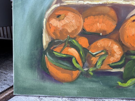 Tangerines in a wooden basket