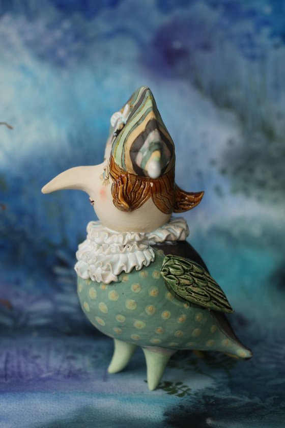 Nosy bird. Ceramic sculpture