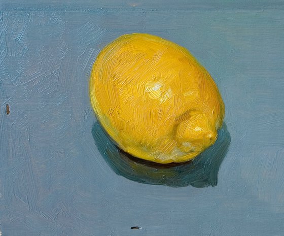 twin yellow lemons on a wood board for food lovers