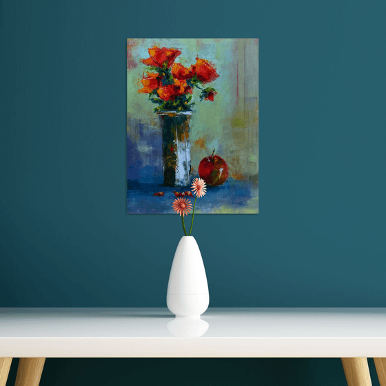 Still life with roses and apple.