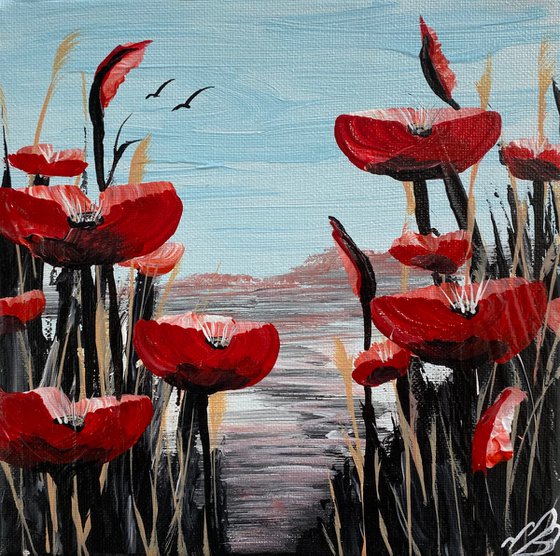 Abstract poppies against a blue sky