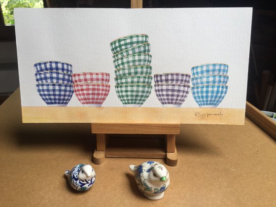 Chequered bowls in a row