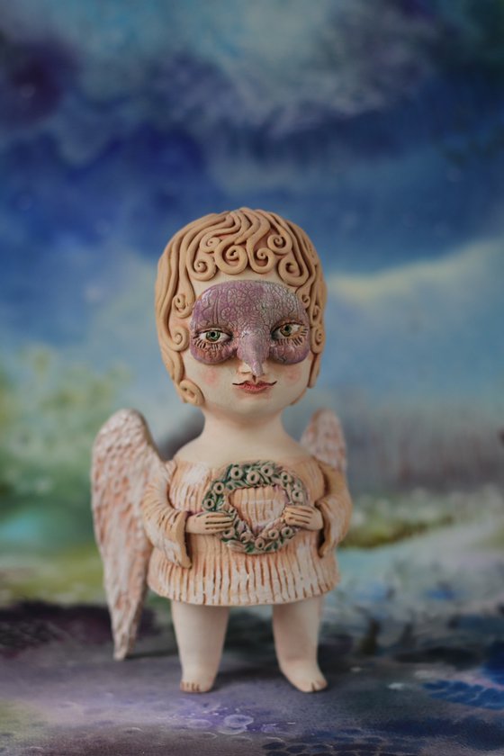 Angel with a mask. Ceramic OOAK sculpture.