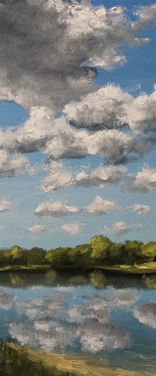 Clouds over the lake by Oleh Rak