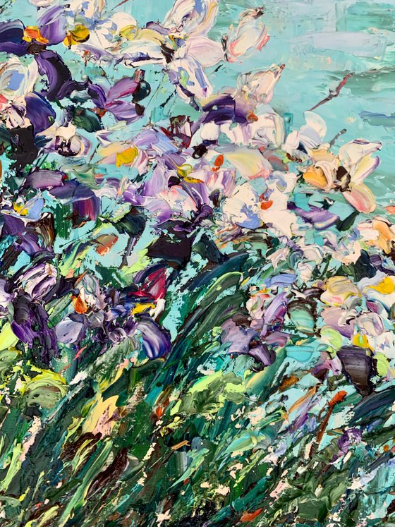 Blooming irises by the pond