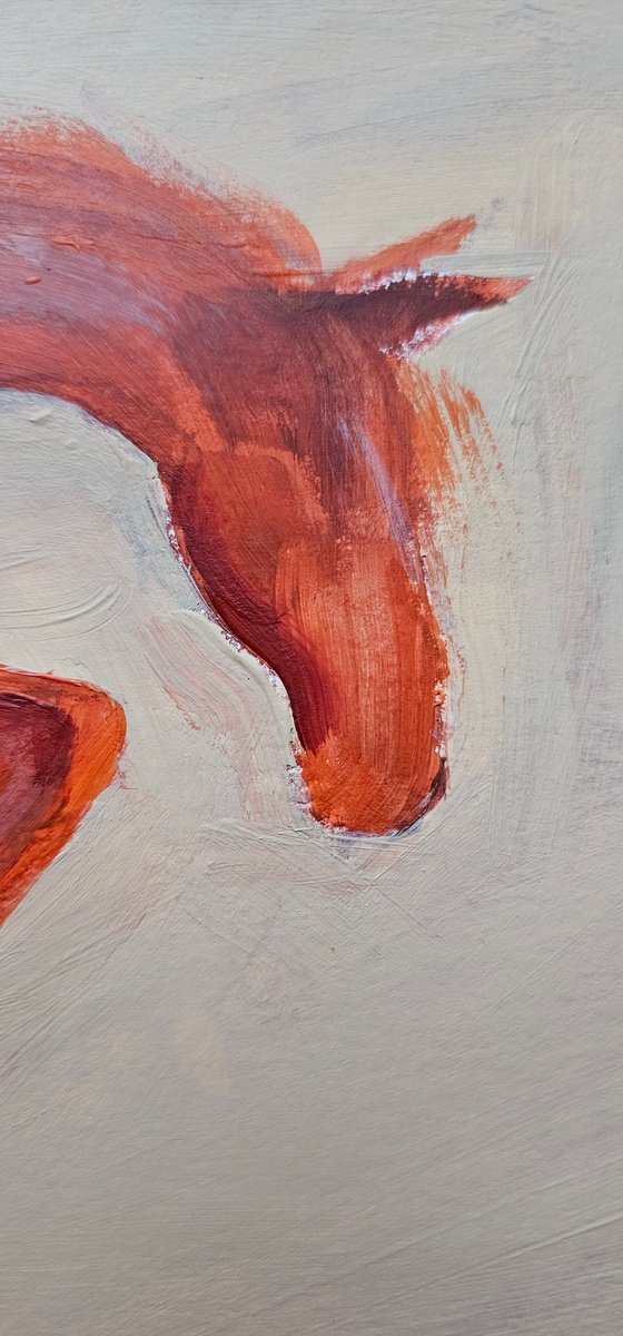 Jumping orange horse