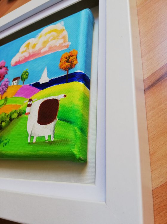 small folk art house and cow canvas painting