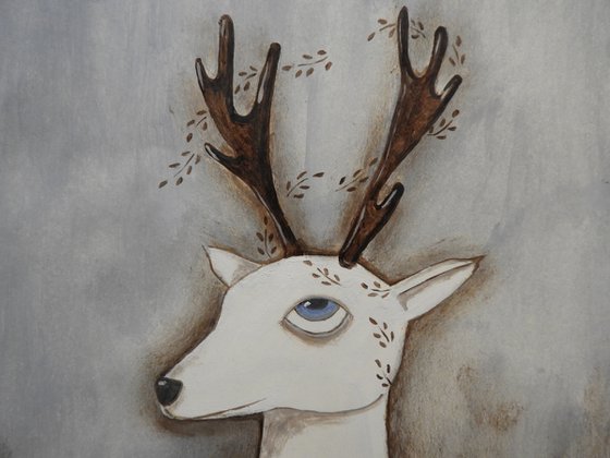 The white deer with leaves