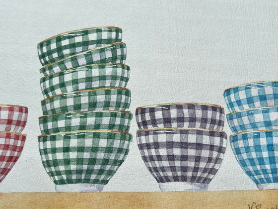 Chequered bowls in a row