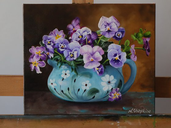 Purple Pansies in a vase